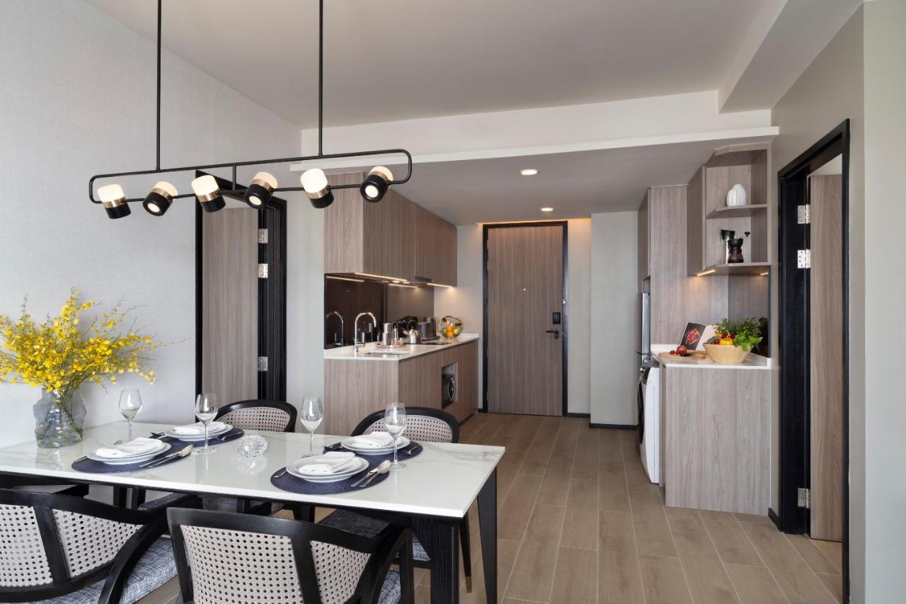 Somerset Pattaya Exterior foto The kitchen and dining area of a typical apartment